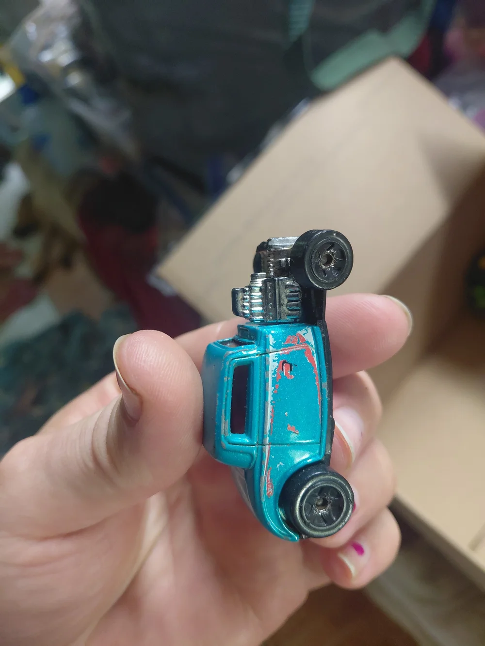 vintage 1997 Hot Wheels '32 Ford die-cast toy car in a light blue color.
